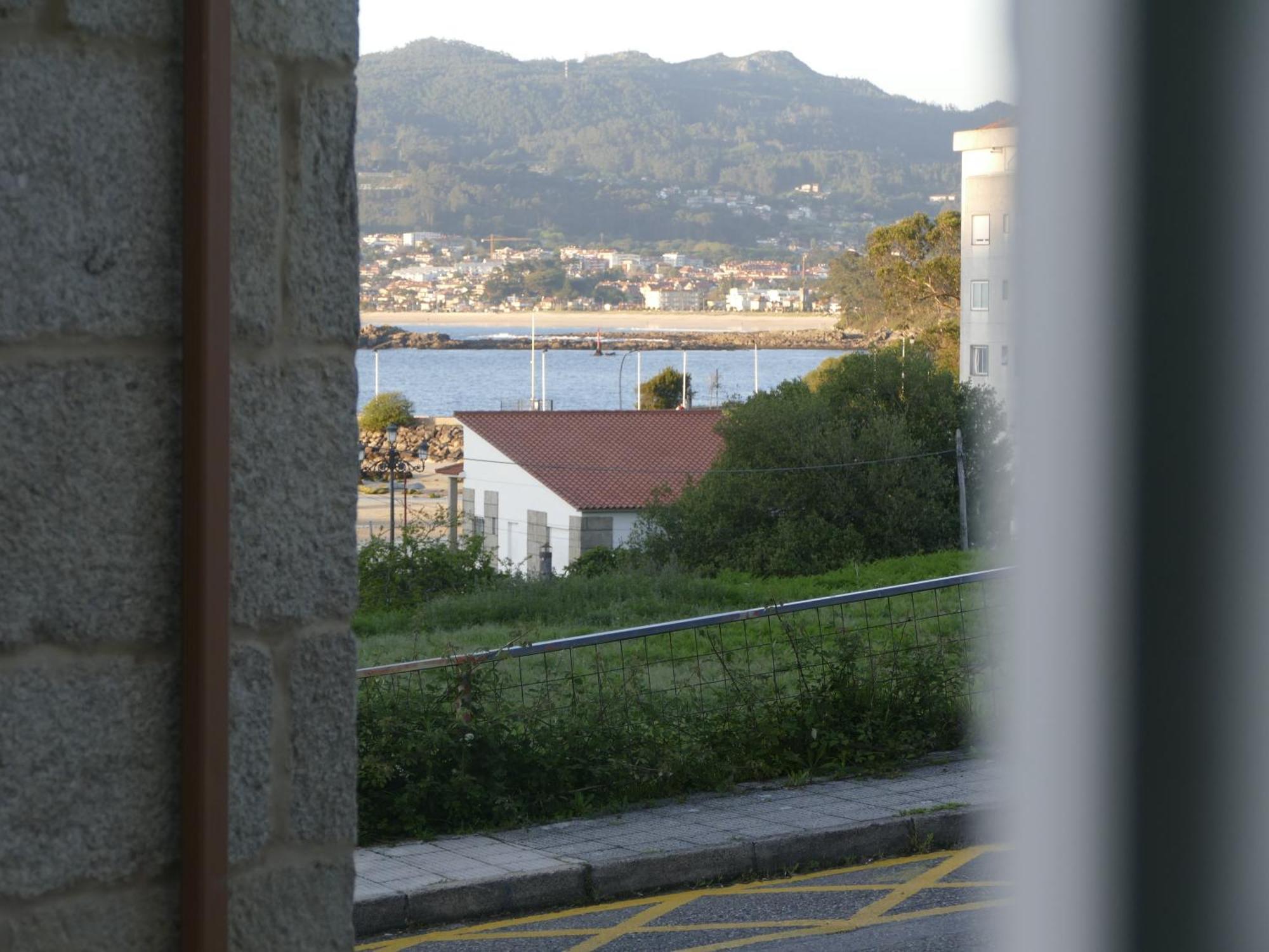 Casa Al Lado De La Playa Santa Marta Baiona Villa Bagian luar foto
