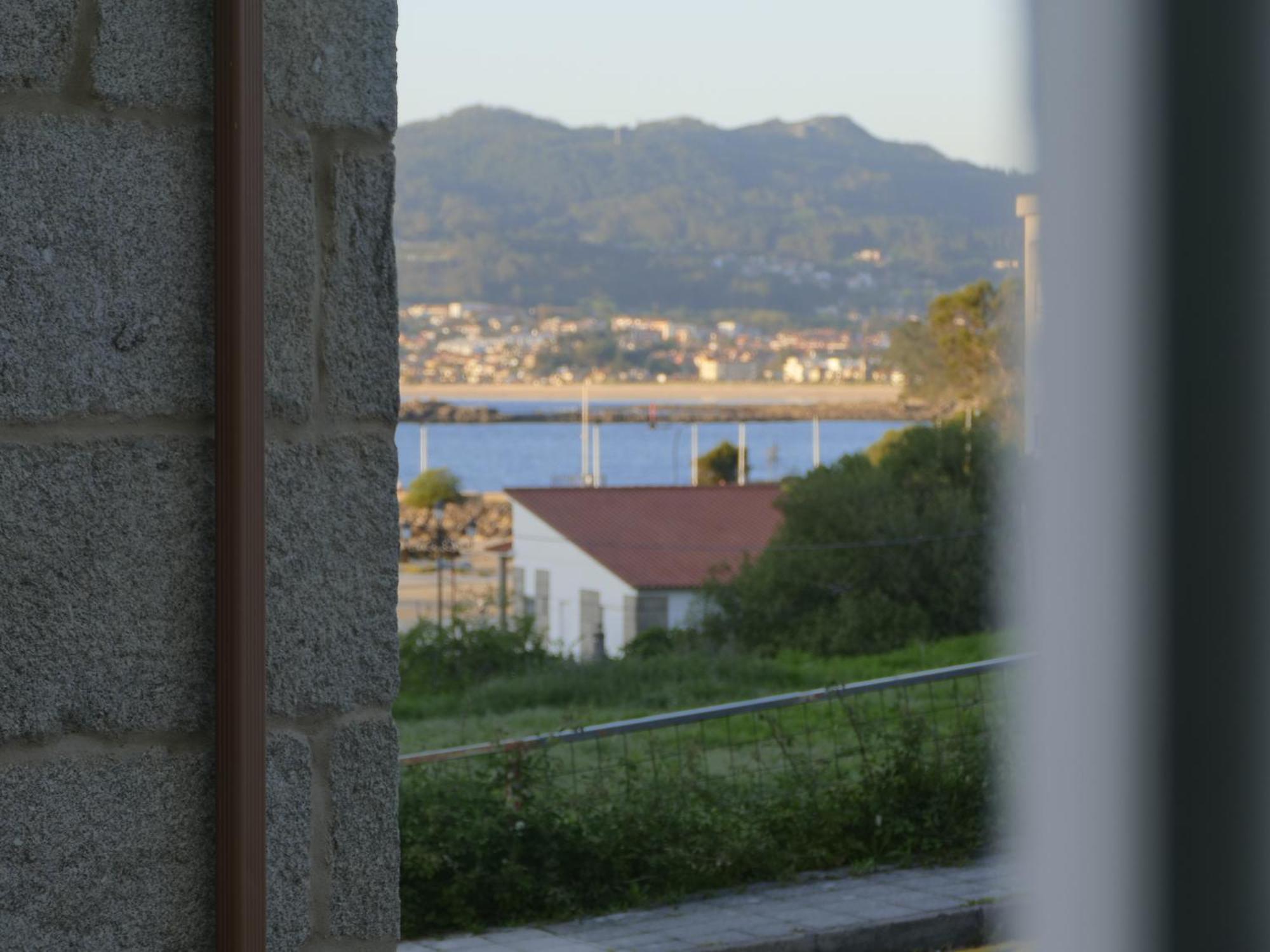 Casa Al Lado De La Playa Santa Marta Baiona Villa Bagian luar foto